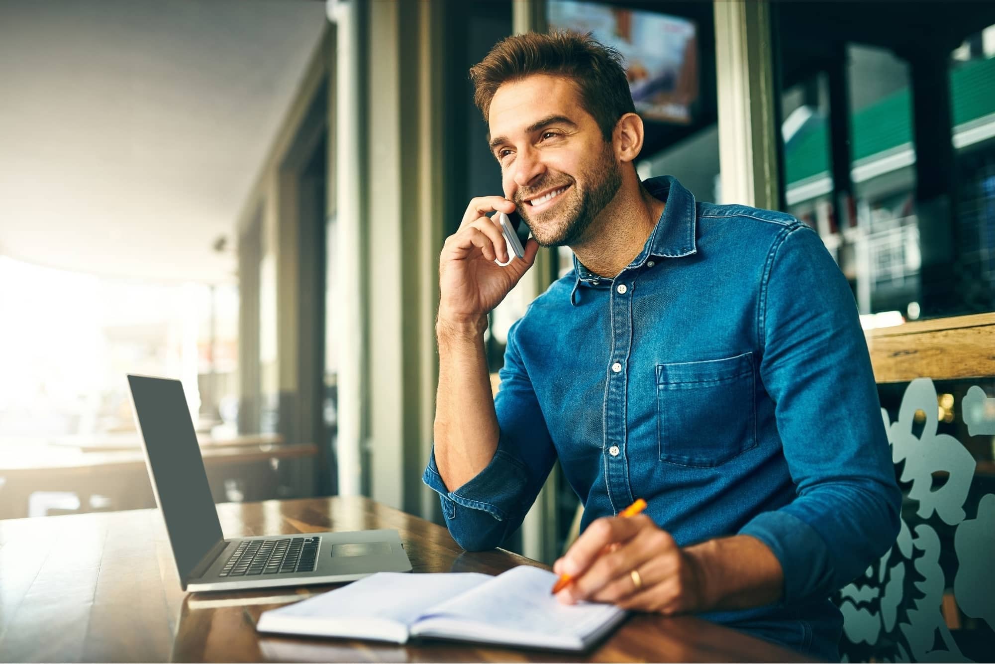 person on phone smiling